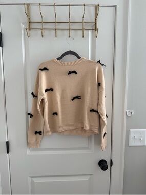 Dreamers Cream Sweater with Black Bow Accents